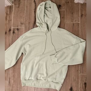 mint green hoodie
